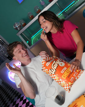 WAVERS Extra Cheesy bag close-up with rich cheese notes