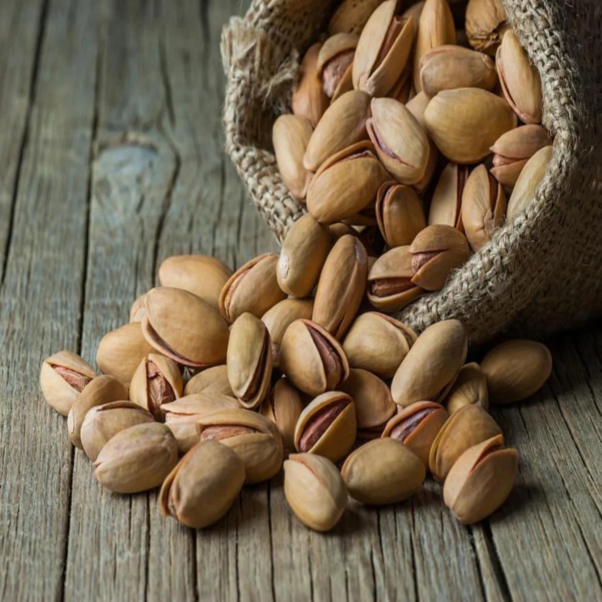 We Got Nuts Turkish Pistachios Antep in-shell on a serving board for entertaining.