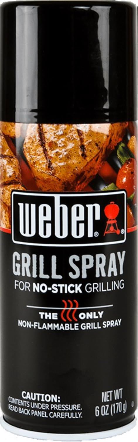 Weber Grill'N Spray being applied on a hot grill for safe use.