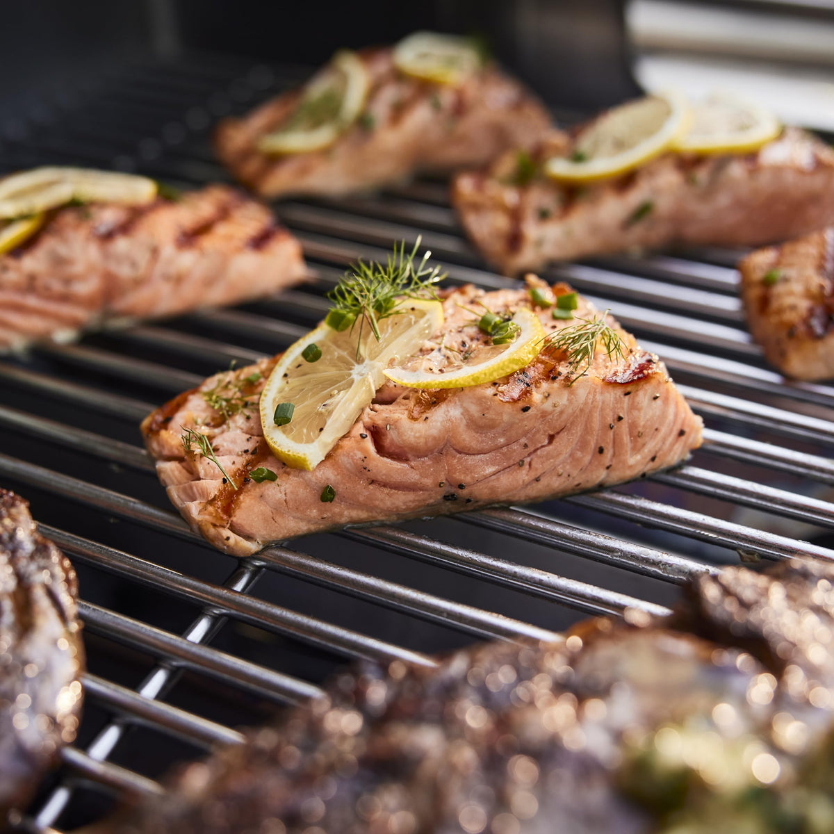Weber Just Add Water Garlic and Herb Marinade on grilled meat demonstrates easy, flavorful coverage