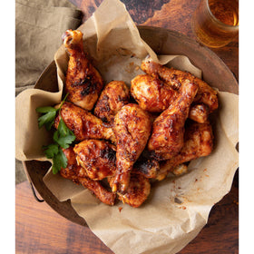 Weber Kick'N Chicken Seasoning on chicken dish boosts savory aroma.