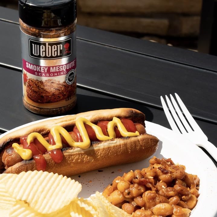 Weber Smokey Mesquite seasoning in kitchen with grill-ready meats