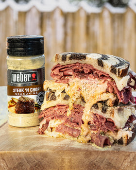 Weber Steak N Chop Seasoning pouring action shows easy seasoning for steaks
