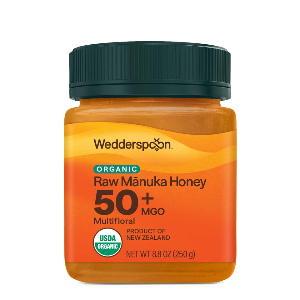 Wedderspoon Manuka honey 50+ MGO jar close-up for pure organic sweetness