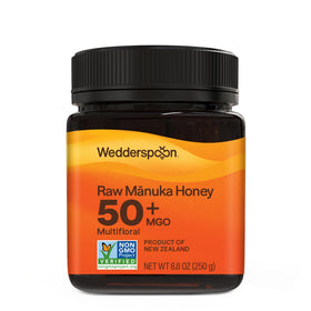 Wedderspoon Raw Manuka Honey 50+ MGO jar showing creamy texture and natural sweetness