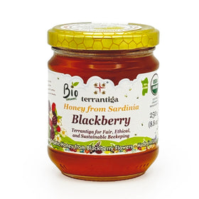 WellEatable blackberry honey bottle from Sardinia, showcasing organic purity for everyday sweetness.