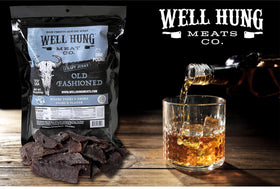 Well Hung Jerky bag closeup label showcases authentic smoke flavor and easy reseal for fresh bites.