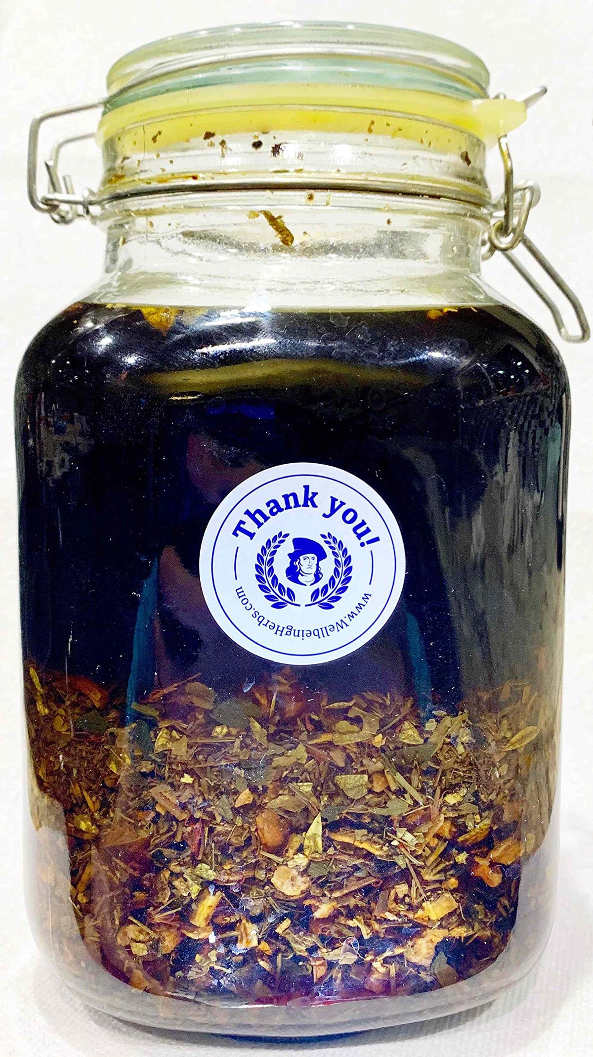 Herbal infusion setup with Swedish Bitters, suited for homemade tinctures.