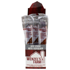Wenzel's Farm Pepperjack sticks in hand ready to snack during outdoors.