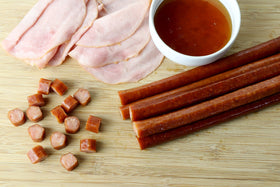 Wenzel's Farm Honey Ham Sticks—smoked with real hickory for rich flavor.