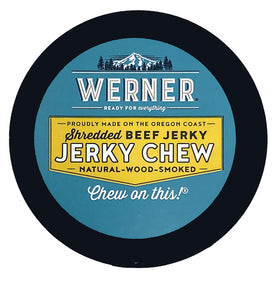 Werner shredded beef jerky chew close-up shows tender, spice-coated texture.