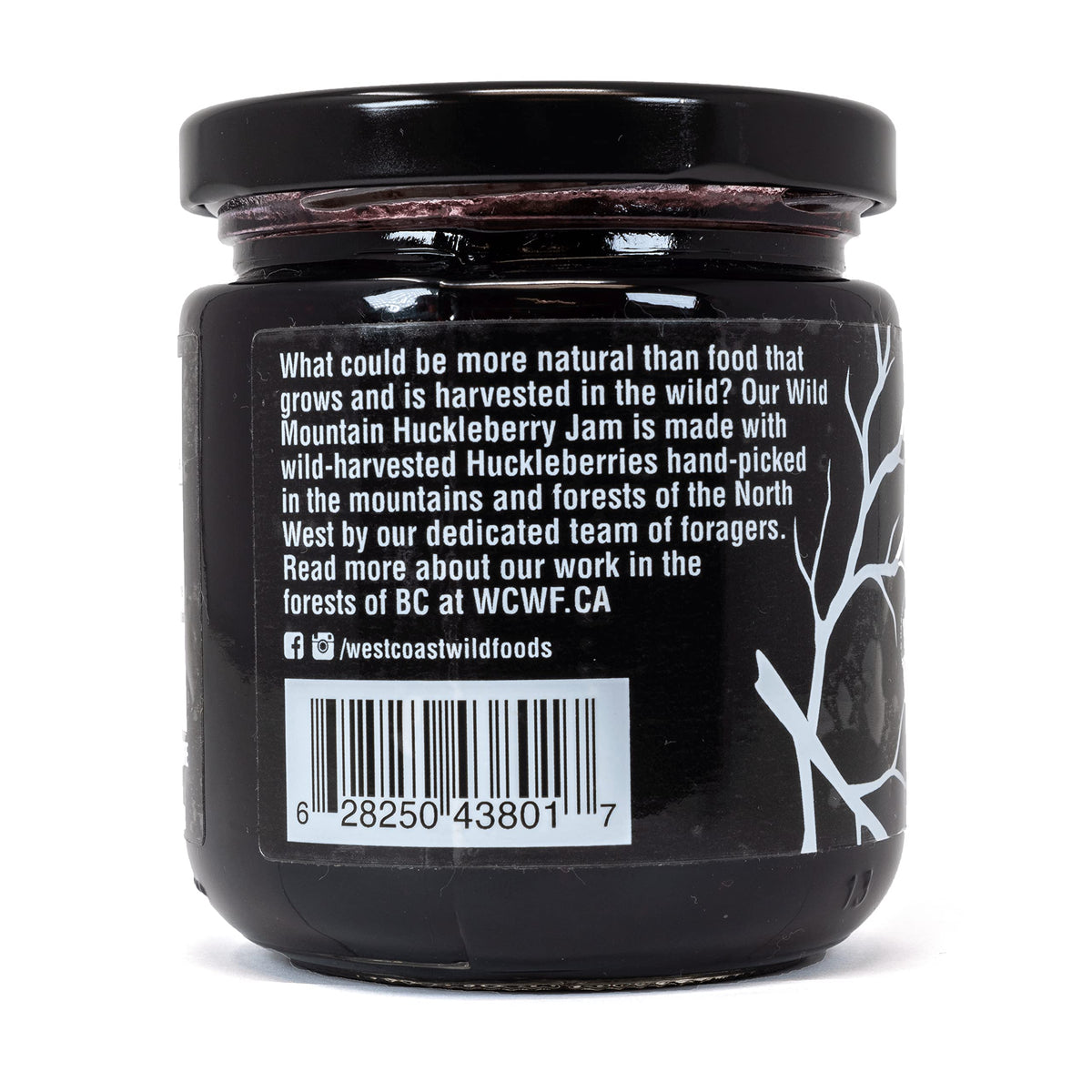 West Coast Wild Foods Wild Huckleberry Jam closeup reveals deep berries and color