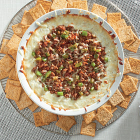 Wheat Thins Sundried Tomato & Basil on a cheese board.
