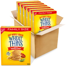 Wheat Thins Sundried Tomato & Basil six-pack crackers on kitchen counter, great for sharing.