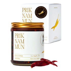 White Elephant Prik Nam Mun bottle pour highlights bold, versatile flavor for home cooks.