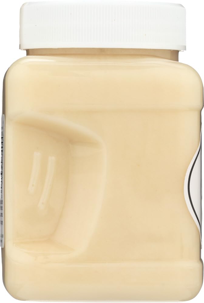 White Gold Honey jar pour shows smooth flow for easy drizzle.
