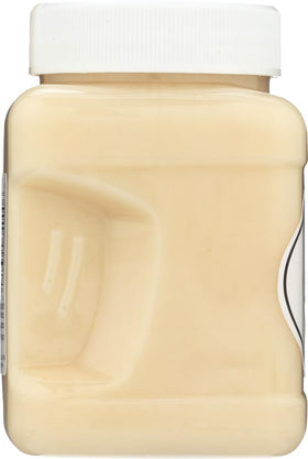 White Gold Honey jar pour shows smooth flow for easy drizzle.