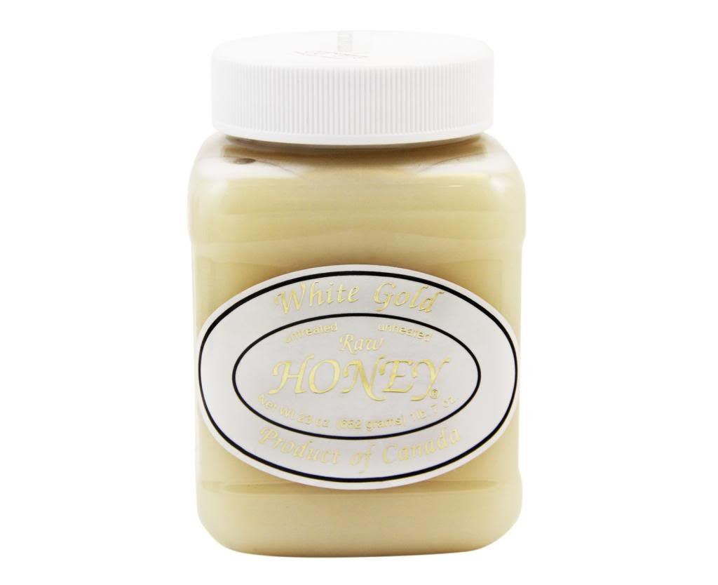 White Gold Raw Honey jar for natural sweetness in tea and baking.