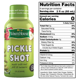 Close-up of White House Pickle Shots being poured, showcasing real dill