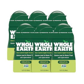 Whole Earth liquid stevia and monk fruit bottle being squeezed for easy pour.