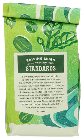 Whole Foods Market El Volcán light roast coffee beans close-up highlighting aroma-rich oils.