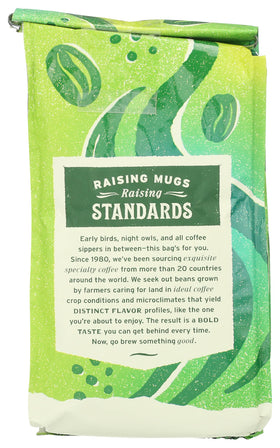 Cup of Whole Foods Market coffee with steam ready for a morning brew.