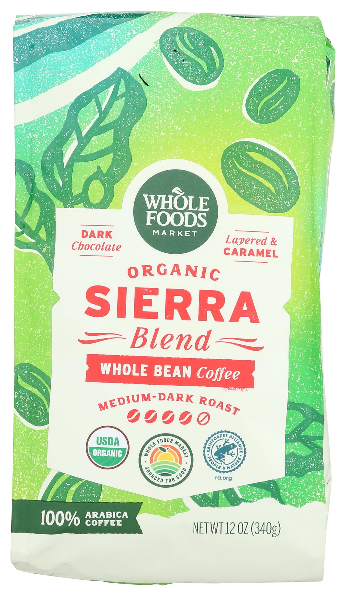 Whole Foods Market Organic Sierra Blend coffee beans reveal rich dark chocolate notes.