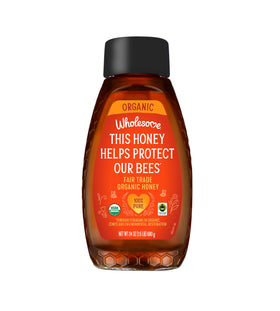Wholesome organic honey bottle 24oz showcasing pure organic sweetness for tea and snacks.