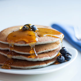 Wholesome Organic Pancake Syrup pours evenly on pancakes for a sweet start