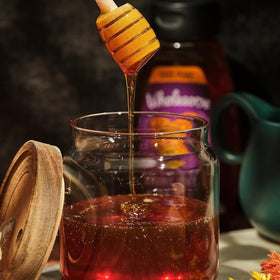 Wholesome Organic Raw Honey drizzled on yogurt as a tasty topping