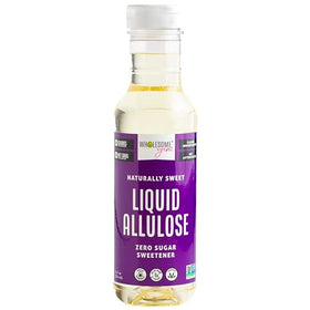 Wholesome Yum Liquid Allulose Sweetener poured into coffee for sugar-free sweetness