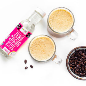 Wholesome Yum Zero Sugar Coffee Syrup vanilla on a kitchen counter invites flavorful beverages.