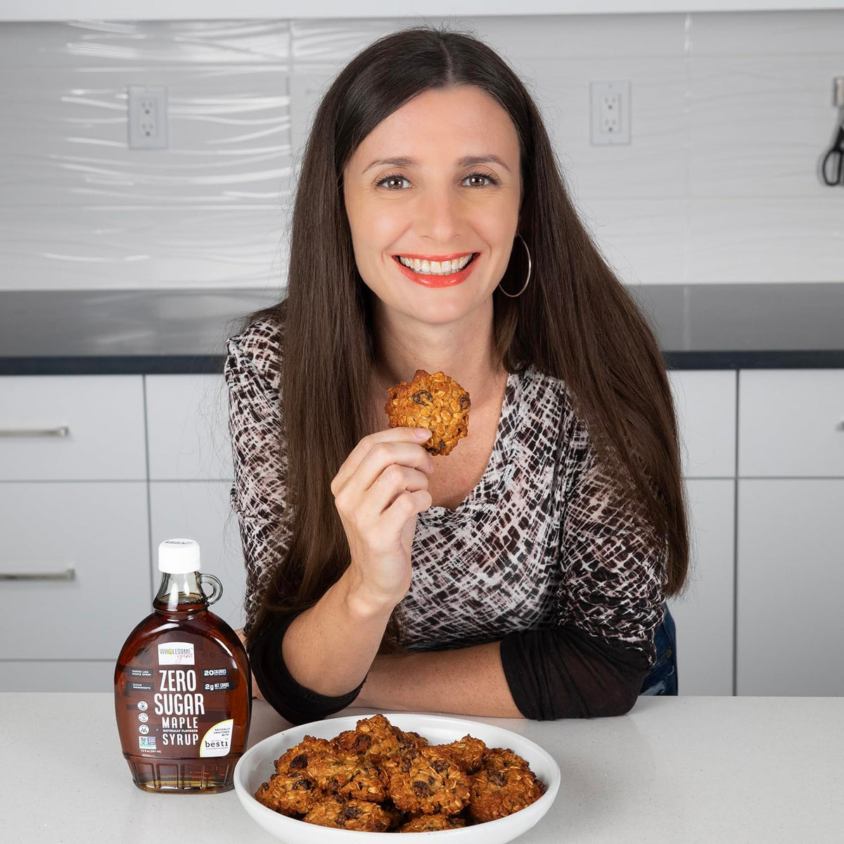Wholesome Yum Zero Sugar Maple Syrup glass bottle on kitchen counter