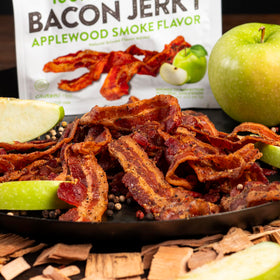 Wicked Cutz Applewood Smoked Bacon Jerky with glaze, savory aroma.