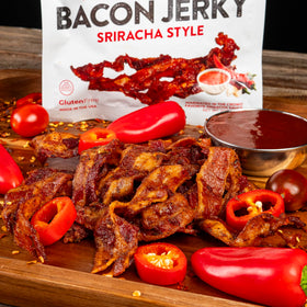 Thick-cut Wicked Cutz Sriracha Bacon Jerky bite close-up