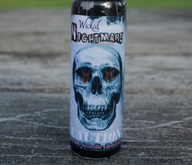 Wicked Nightmare Extract small-drops action shows tiny amounts needed.