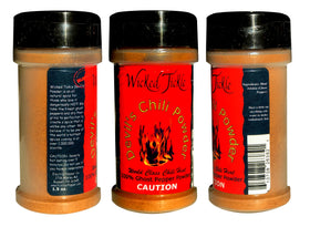 Wicked Reaper scorpion chili powder label close-up showing premium packaging.