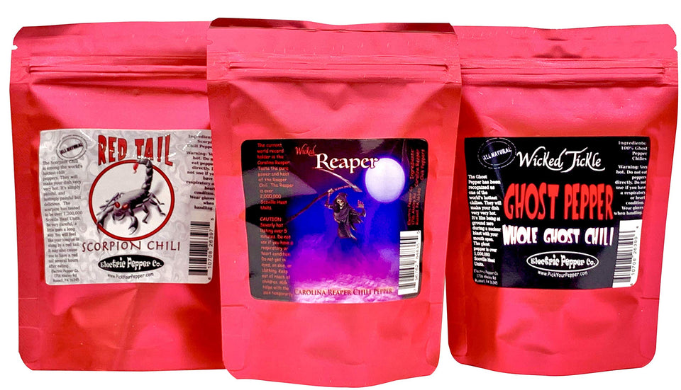 Wicked Tickle Superhot Gift Set displaying Ghost, Scorpion, and Reaper peppers for bold heat challenges.