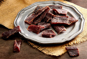 Wild Bill's jerky marinated in soy, garlic, and pepper for bold flavor