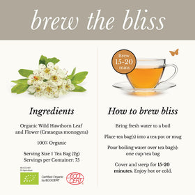 Brewed Wild Bliss hawthorn tea steaming in a cup, inviting a calm moment.
