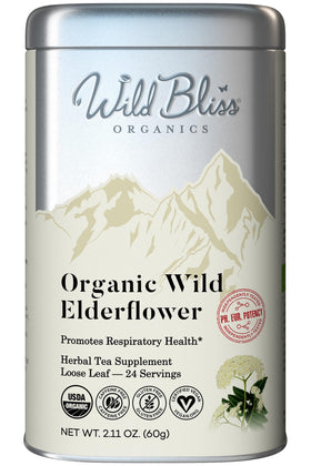 Wild Bliss Elderflower Tea canister with dried blossoms ready to steep in a comforting cup