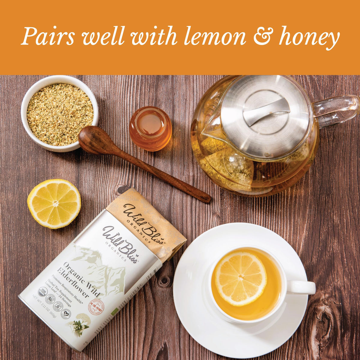 Wild Bliss Elderflower Tea served with lemon and honey for a comforting, caffeine-free treat