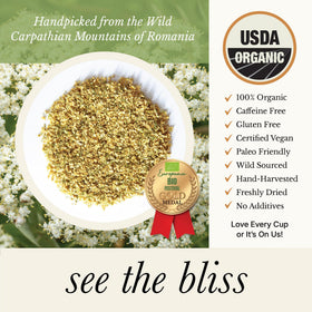 Wild Bliss Elderflower Tea brewing in a cup with light golden infusion