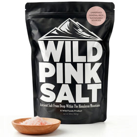Wild Foods Pink Himalayan Salt bottle pour highlights mineral-rich seasoning for cooking