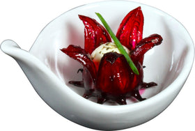 Wild Hibiscus Flowers in Syrup visible in jar; adds sophistication to beverages.