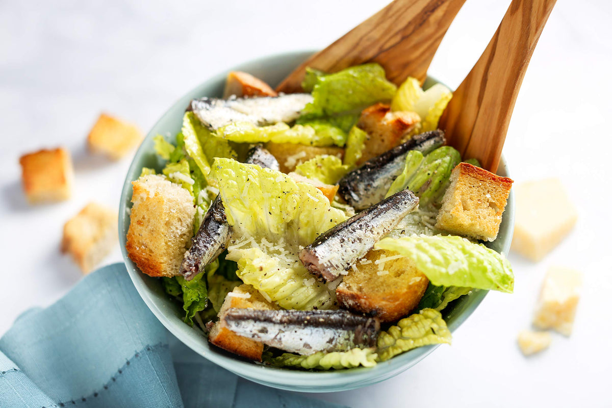 Wild Planet sustainable sourcing icon signals responsible canned fish choices.