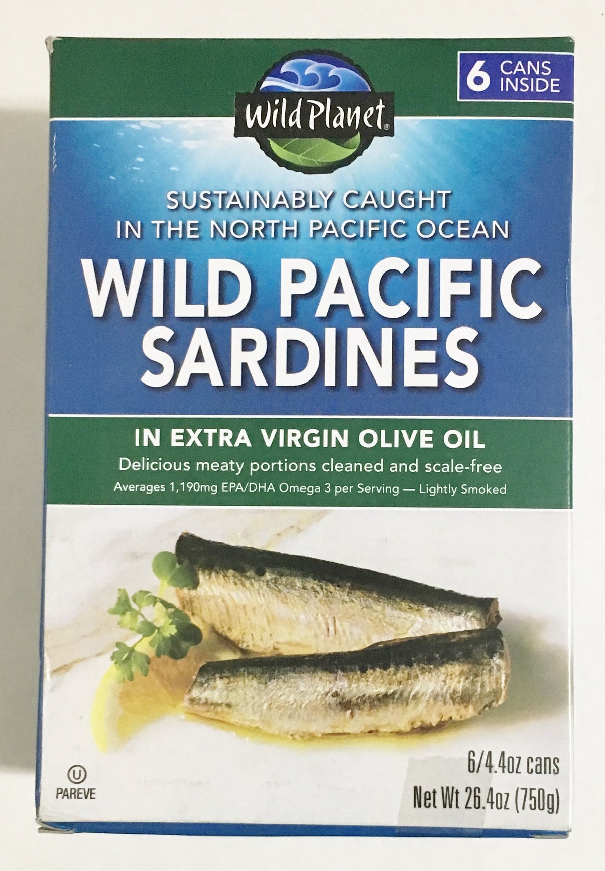 Wild Planet Wild Pacific Sardines in EVOO can with glistening oil, perfect for quick, nutritious meals.