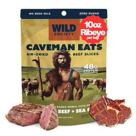 Wild Society Caveman Eats ribeye crisps on bright counter, high-protein snack for workouts