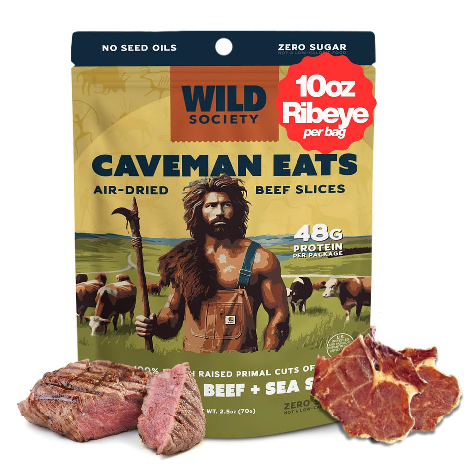 Wild Society Caveman Eats ribeye crisps on bright counter, high-protein snack for workouts