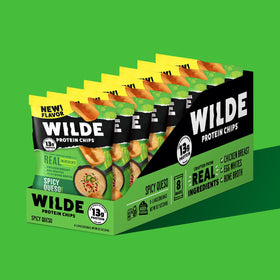 WILDE Protein Chips Spicy Queso pack eight bags ready for on-the-go snacking.